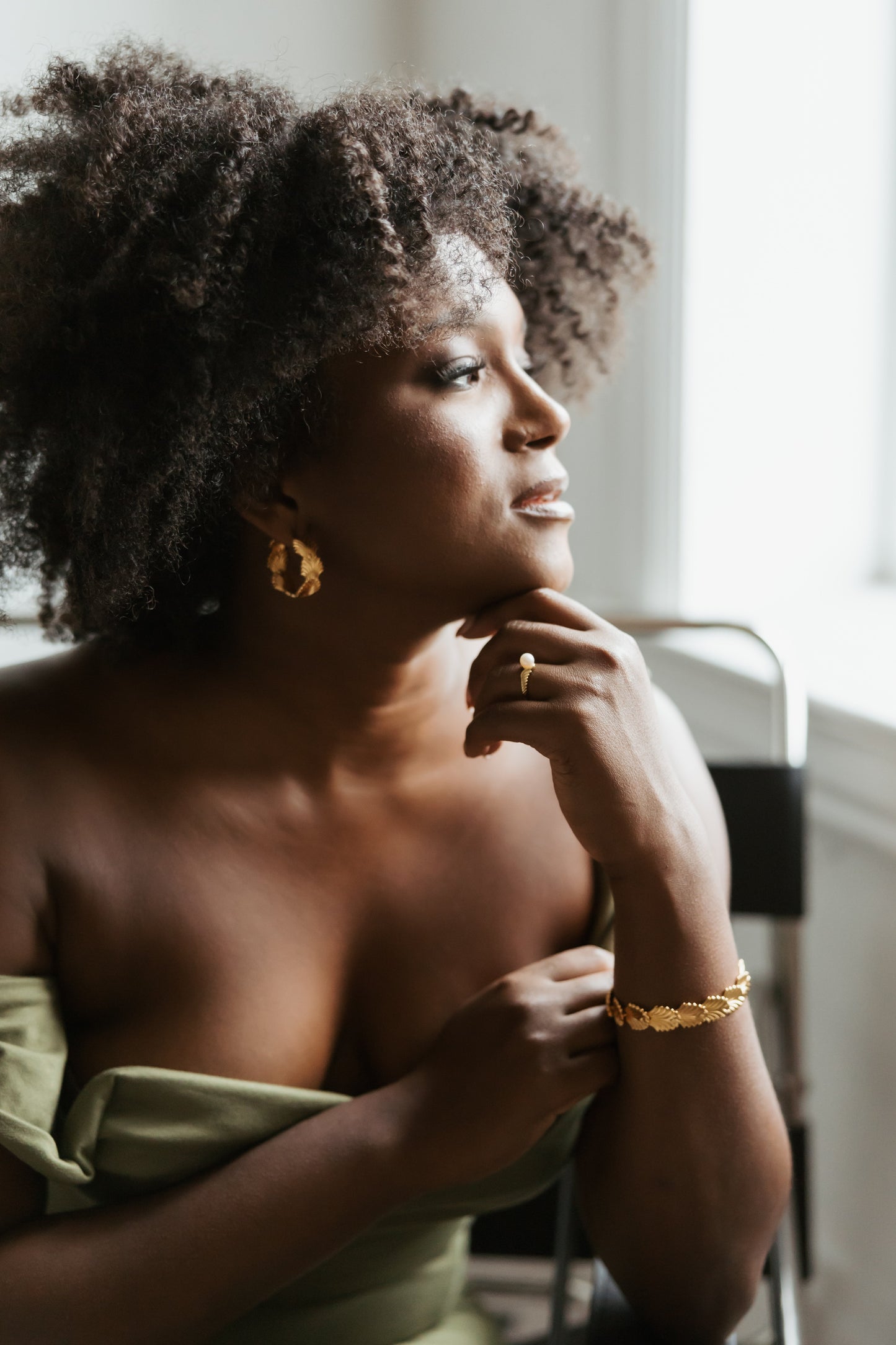 Chic foliage hoop earrings adorned with intricate leaf designs, crafted from durable sterling silver, perfect for adding a touch of nature-inspired elegance to any outfit