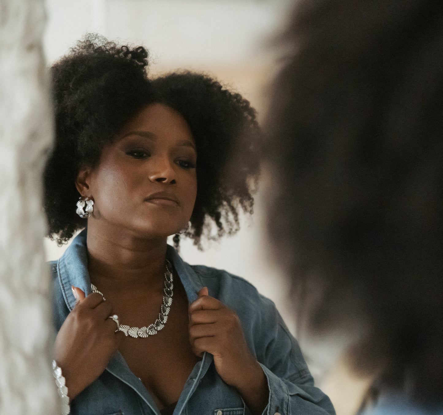 Elegant palm link necklace featuring interconnected palm-shaped links, crafted from high-quality sterling silver, designed for versatile layering and everyday elegance.