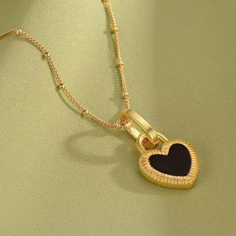 Mother of Pearl and Black Onyx Heart Necklace
